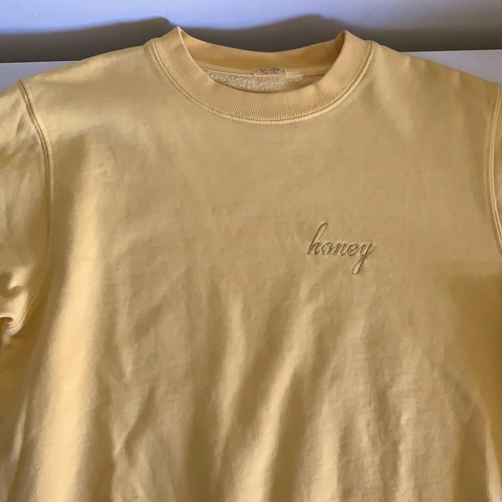 yellow sweater